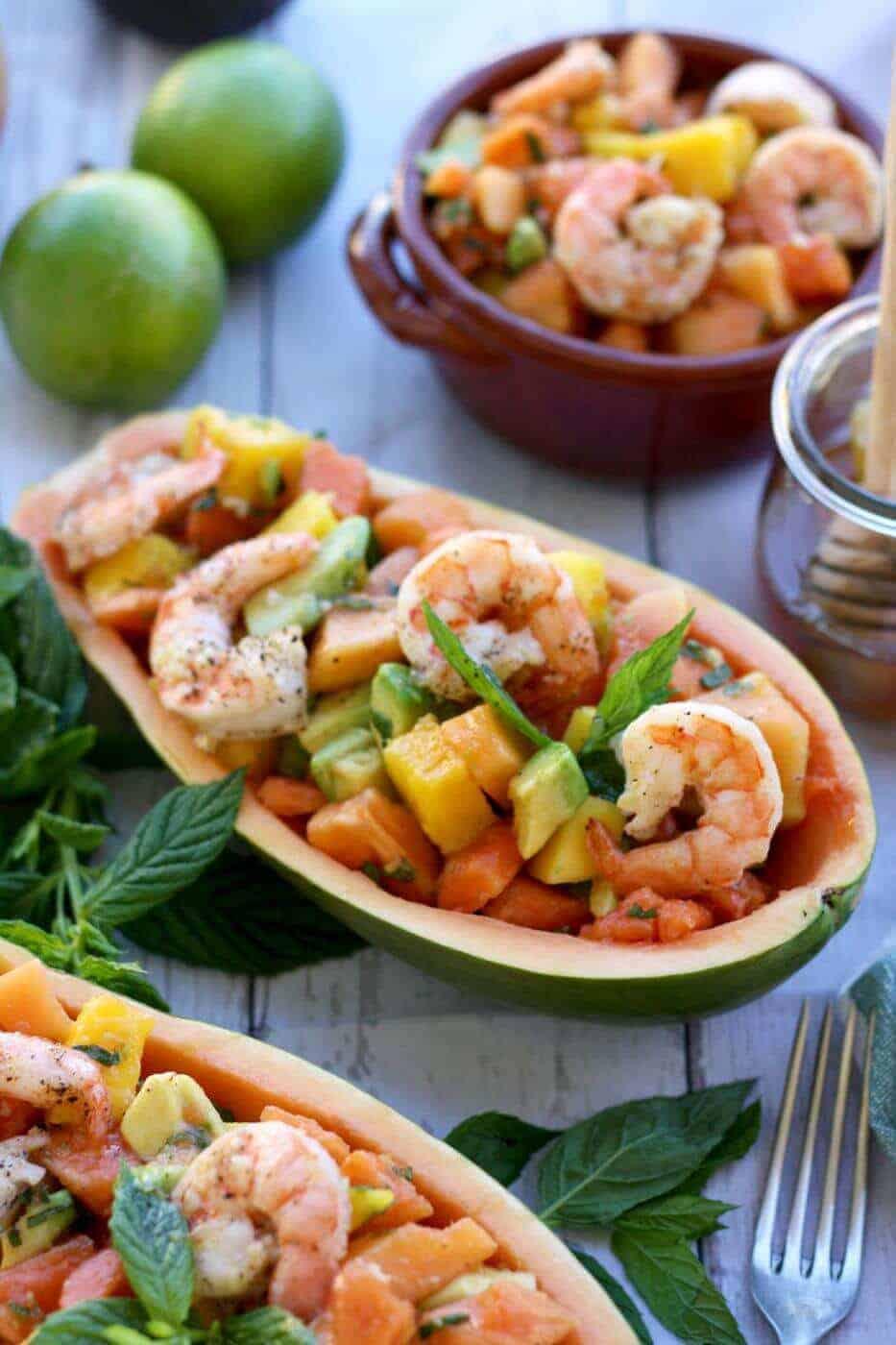 Papaya prawn mango salad served in papaya boats