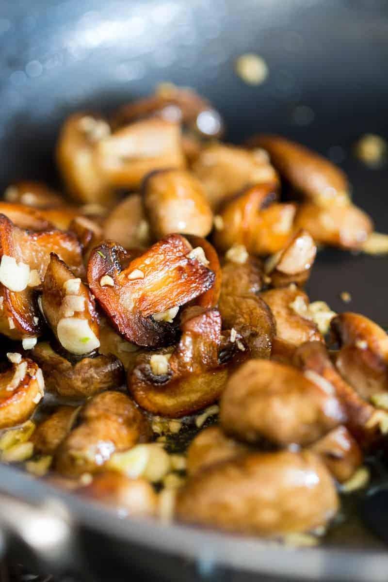 An easy, 15 minute recipe where the traditional spaghetti aglio olio e peperoncino is dressed up with sautéed mushrooms. We love this simple pasta sauce and even add chicken, bacon, anchovies or seafood to it. Perfect for meatless weeknight dinners and a hit with the kids!