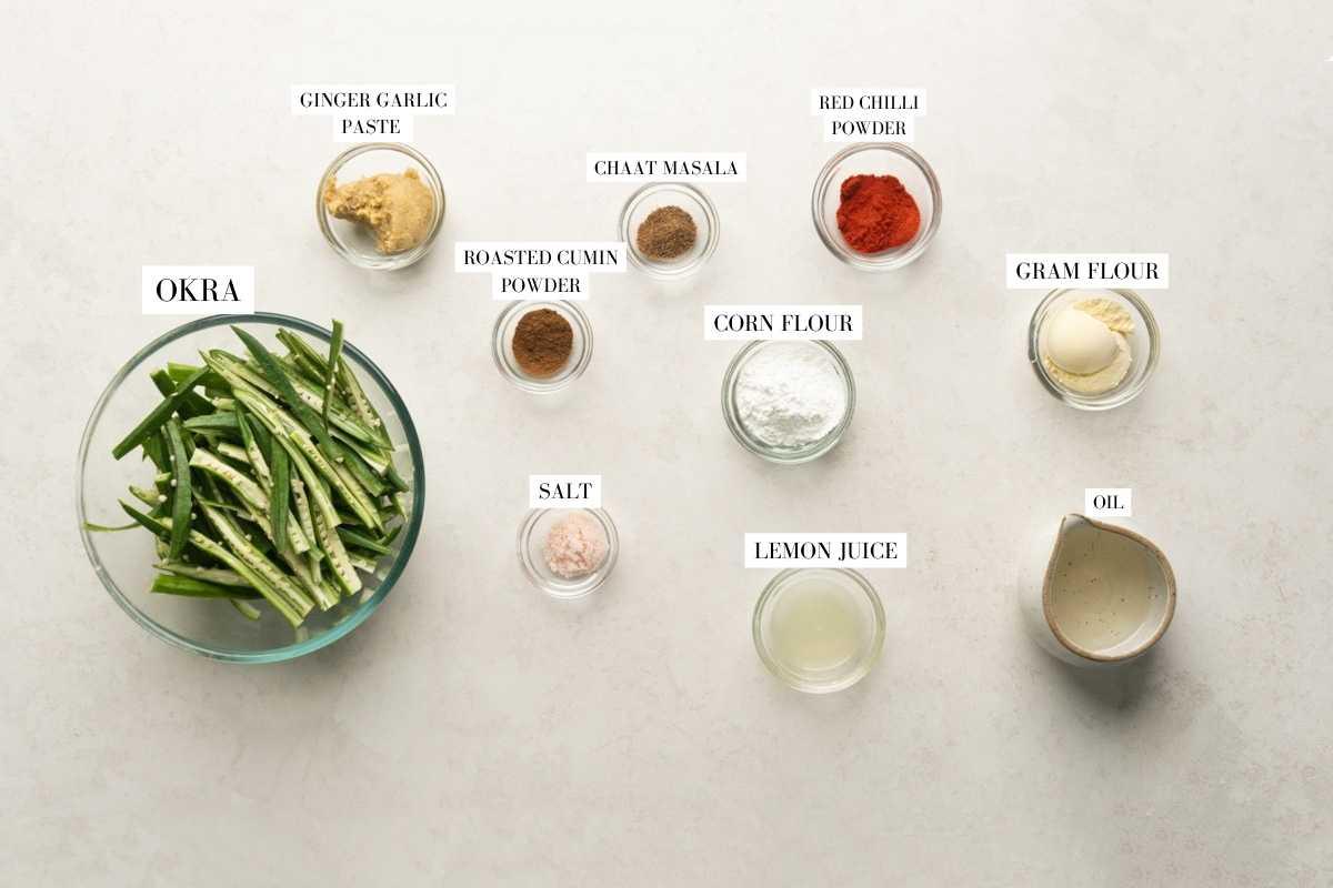 Picture of all the ingredients required for the air fryer kurkuri bhindi with text to identify them