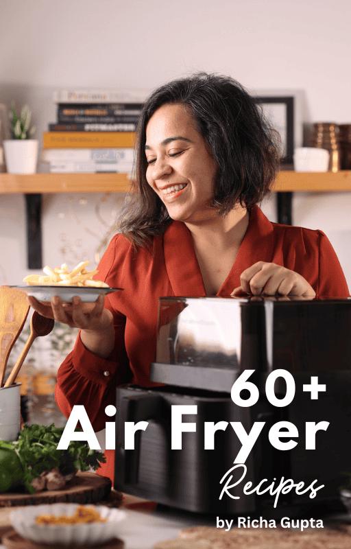 a smiling woman holding a plate of fries and standing next to an air fryer with text overlay