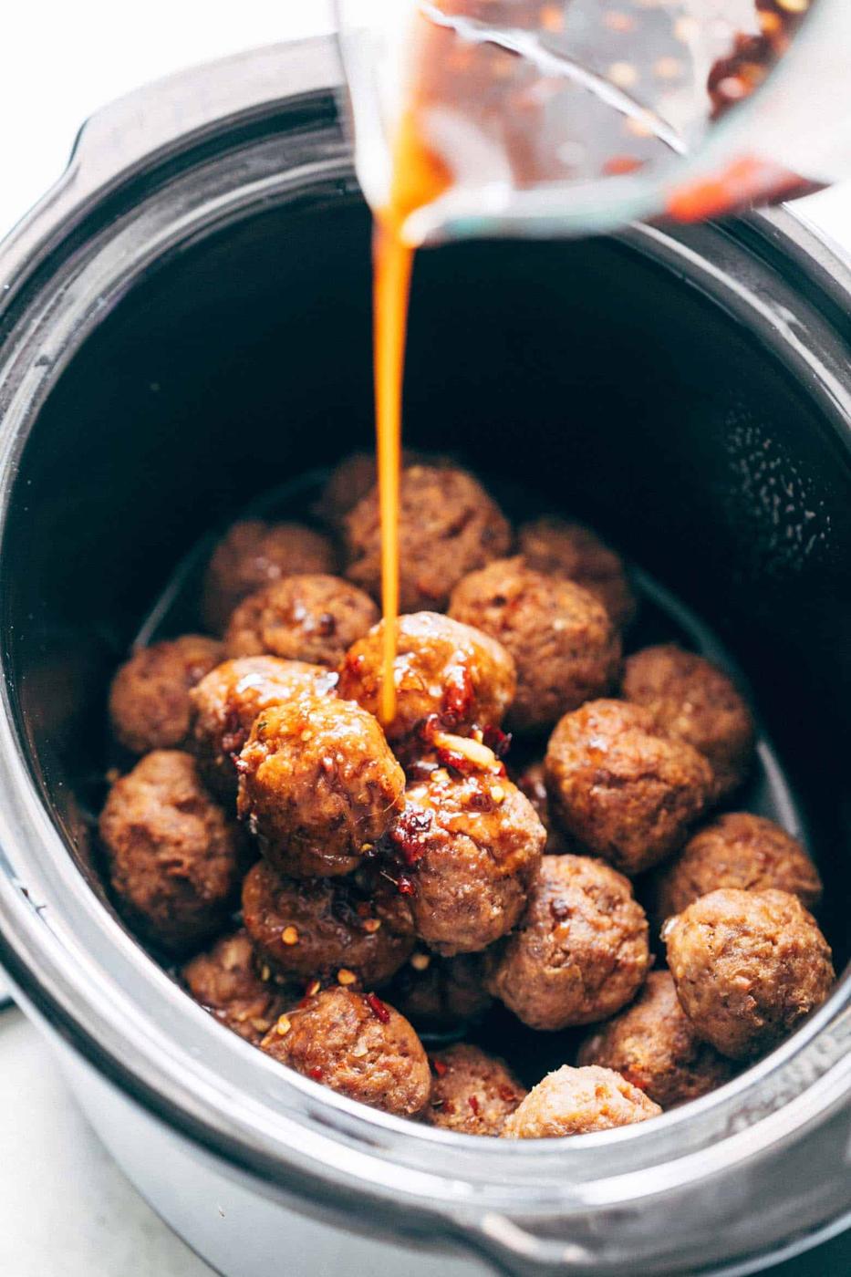 Asian inspired slow cooker teriyaki meatballs with pineapple are super easy, low carb and can be made in your crockpot. Juicy, succulent, these teriyaki pineapple meatballs can also be baked in the oven.