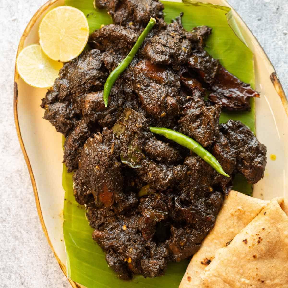Assamese black sesame chicken (til diya murghi mangxo)