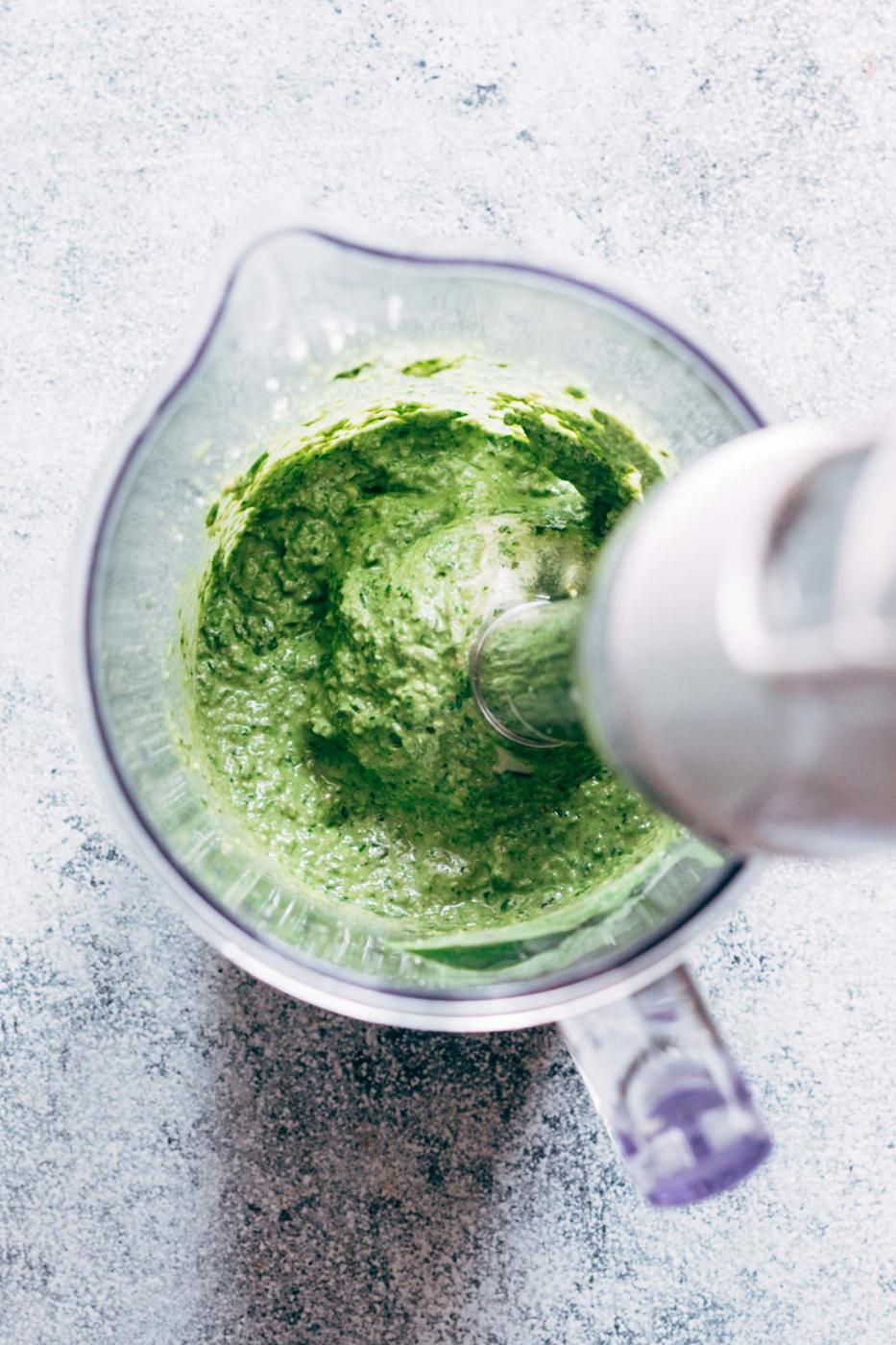 Basil Walnut Pesto is a super easy, homemade vegan pesto recipe that is perfect with pasta dishes, salads, on chicken and salmon as a sauce or even as a dip! The walnuts give it a creamy base which helps avoid the parmesan altogether, and are a great substitute to pine nuts.