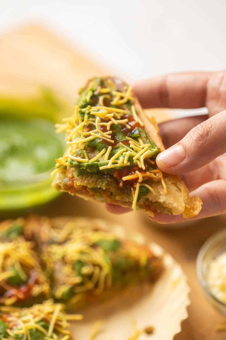 Close up of a slice of bombay sandwich