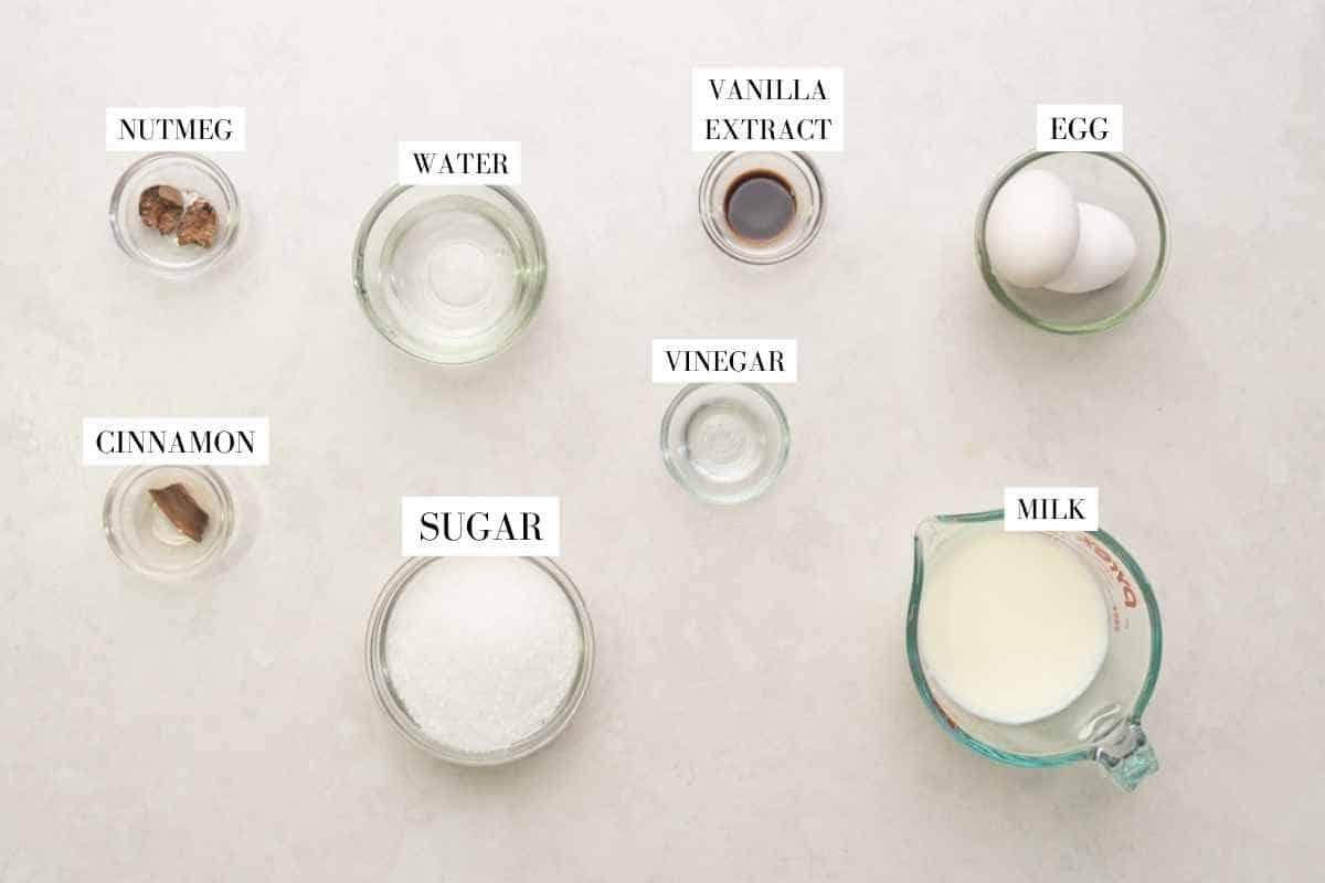 Picture of all the ingredients required for the Caramel Custard with text to identify them