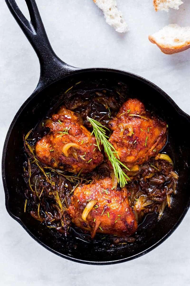 Insanely delicious recipe for 5 ingredient, gluten free caramelized onion and rosemary chicken which takes 30 minutes and only one pan, so no cleanup required!