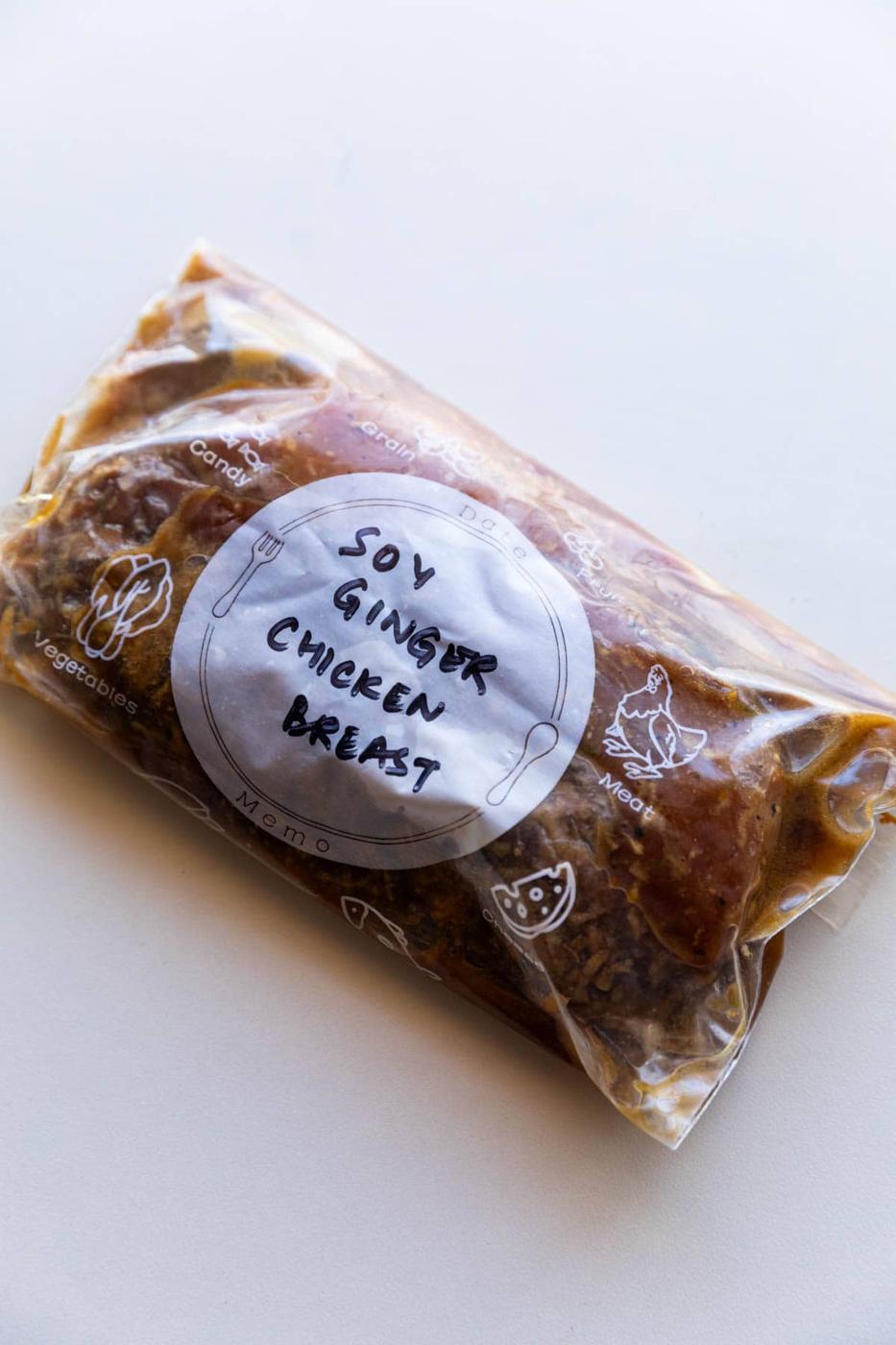 chicken breast marinated in soy ginger marinade and stored in a labelled zip lock bag