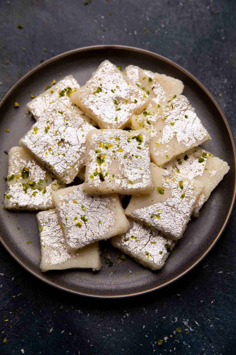 Coconut barfi served on a grey plate