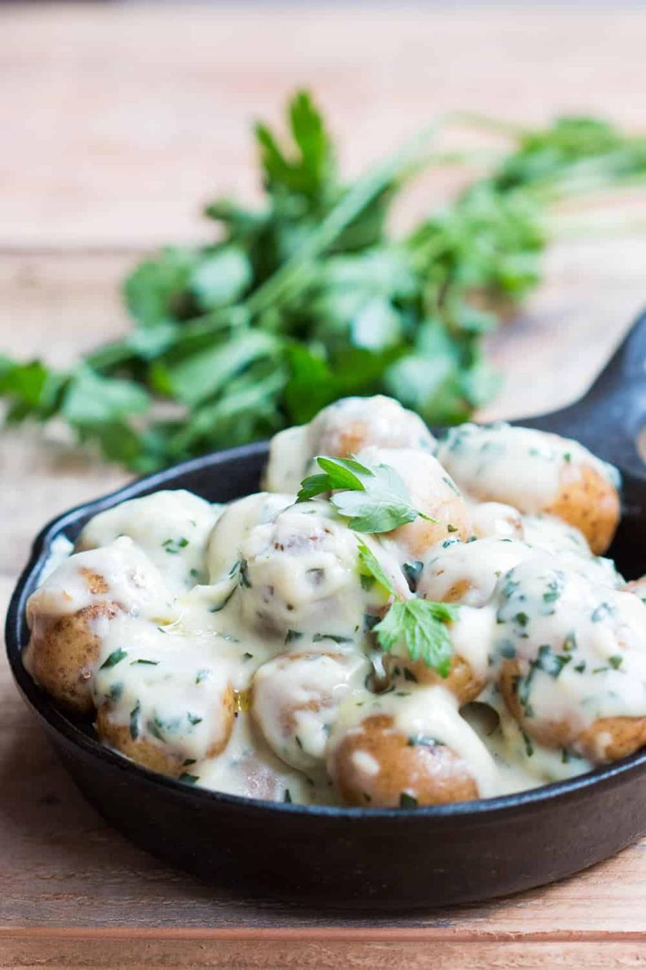 creamy no mayo parsley baby potatoes in a skillet