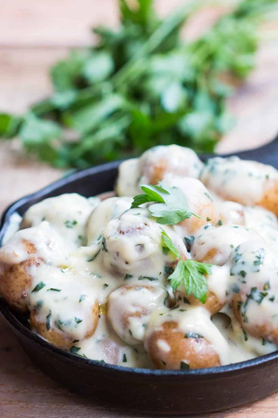 creamy no mayo parsley baby potatoes in a skillet