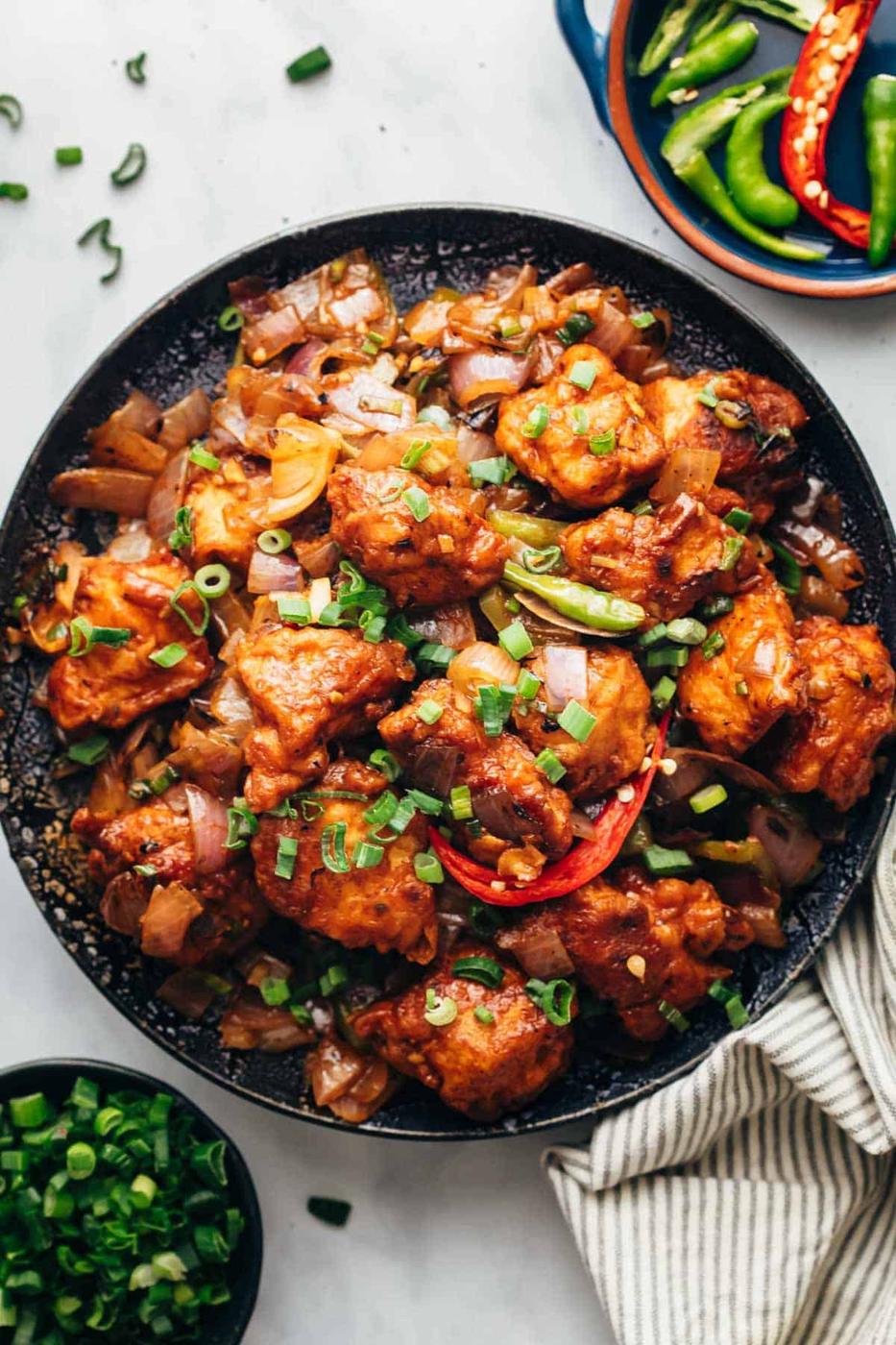 Easy Chinese Chilli Chicken Dry in a black wok.