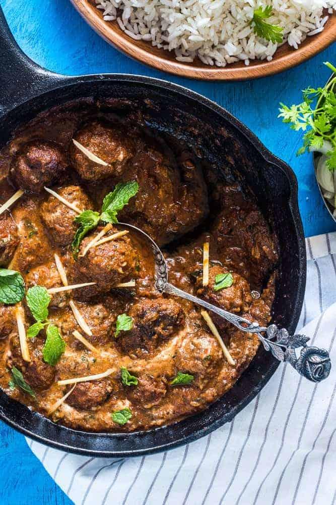 Think Indian food is difficult? This one pot mutton (lamb) kofta curry is super easy and made by forming spiced mutton keema (mince) into meatballs and simmering in a delicious gravy. A few simple ingredients is all it takes to make this easy curry in a hurry!