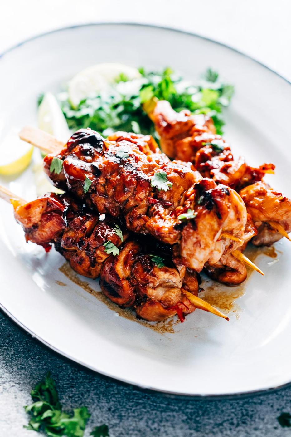 Grilled Sambal Chicken Skewers is an easy, 5 ingredient recipe thats spicy, sweet and sticky! Its a chinese style recipe with sambal oelek, soy sauce and lemon grass.