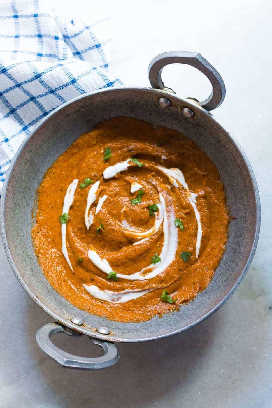 indian makhani gravy in a kahdai