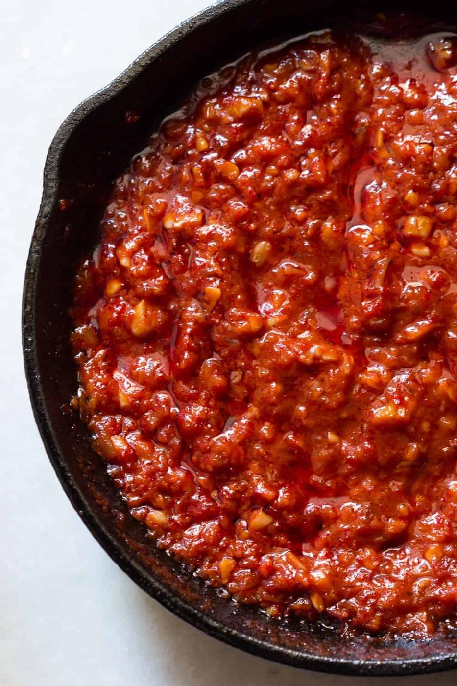 Learn how to make this simple schezwan sauce which is perfect with chicken lollipops, schezwan rice, noodles and manchurian (Step by step video recipe)