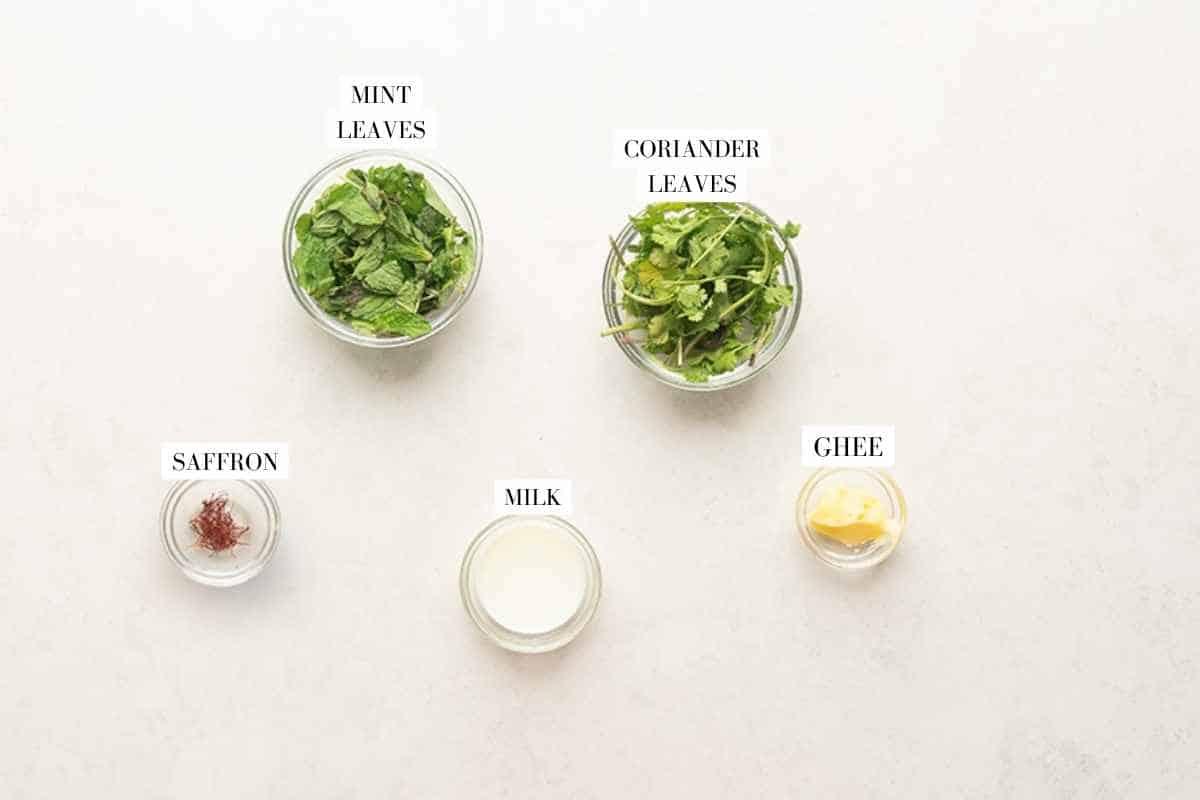 Picture of all the ingredients forInstant Pot Chicken Biryani with text to identify them