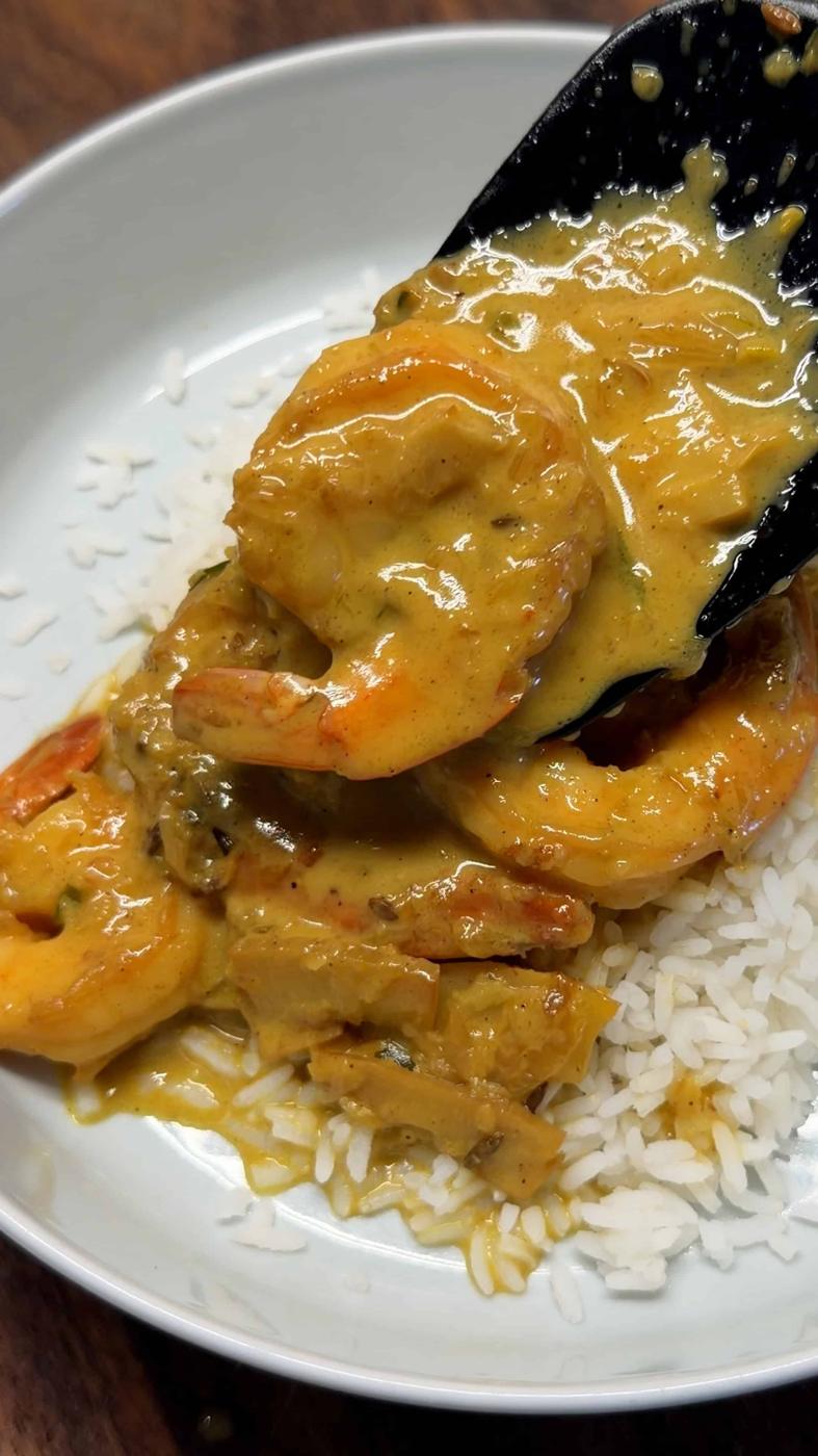 spicy prawn curry served on top of steamed rice