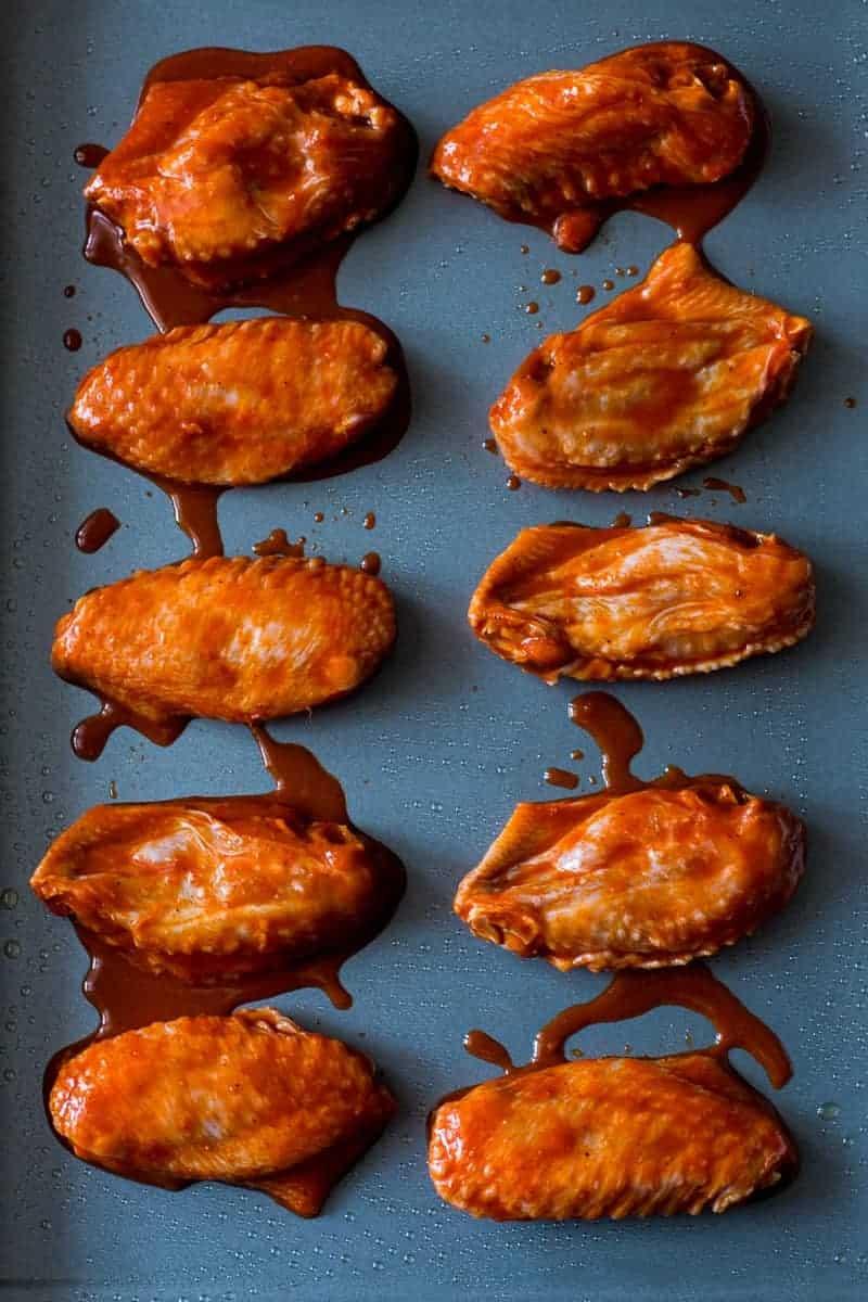 Spicy, crispy, full of umami and insanely addictive Korean baked gochujang chicken wings. You'll never go back to having wings any other way!