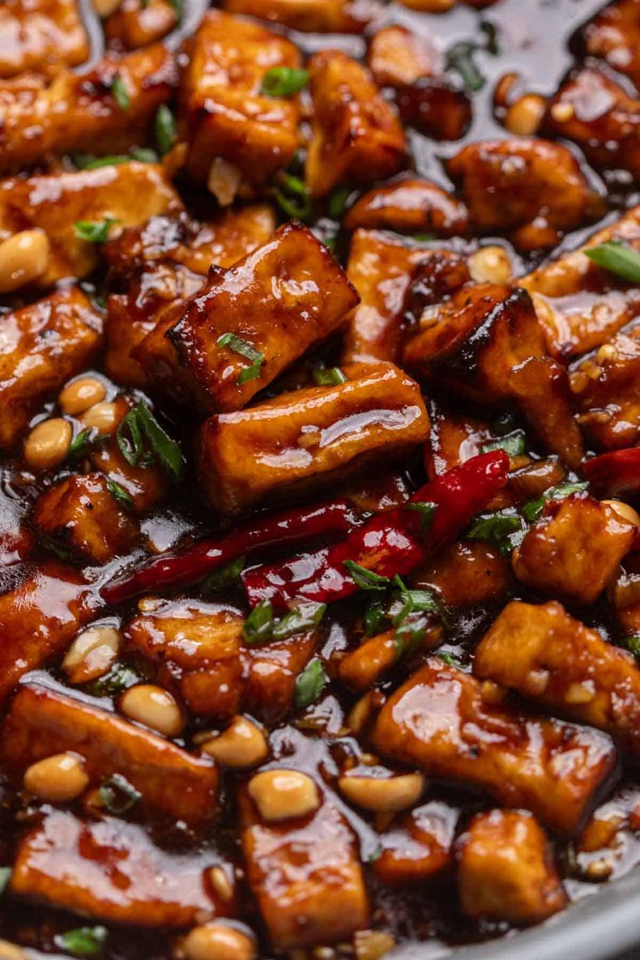 a close up image of kung pao tofu to show it's color and texture