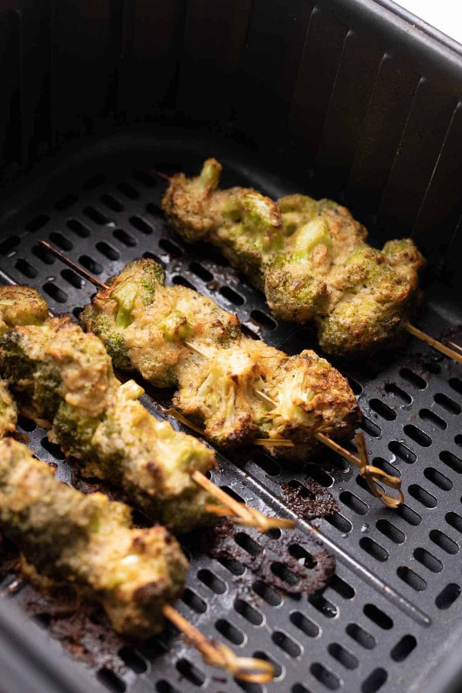 shot of malai broccoli on skewers in the air fryer