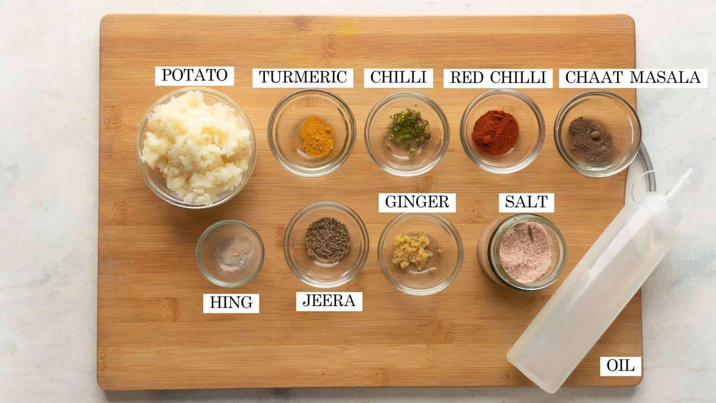 Picture of all the ingredients required for potato filling/aloo masala