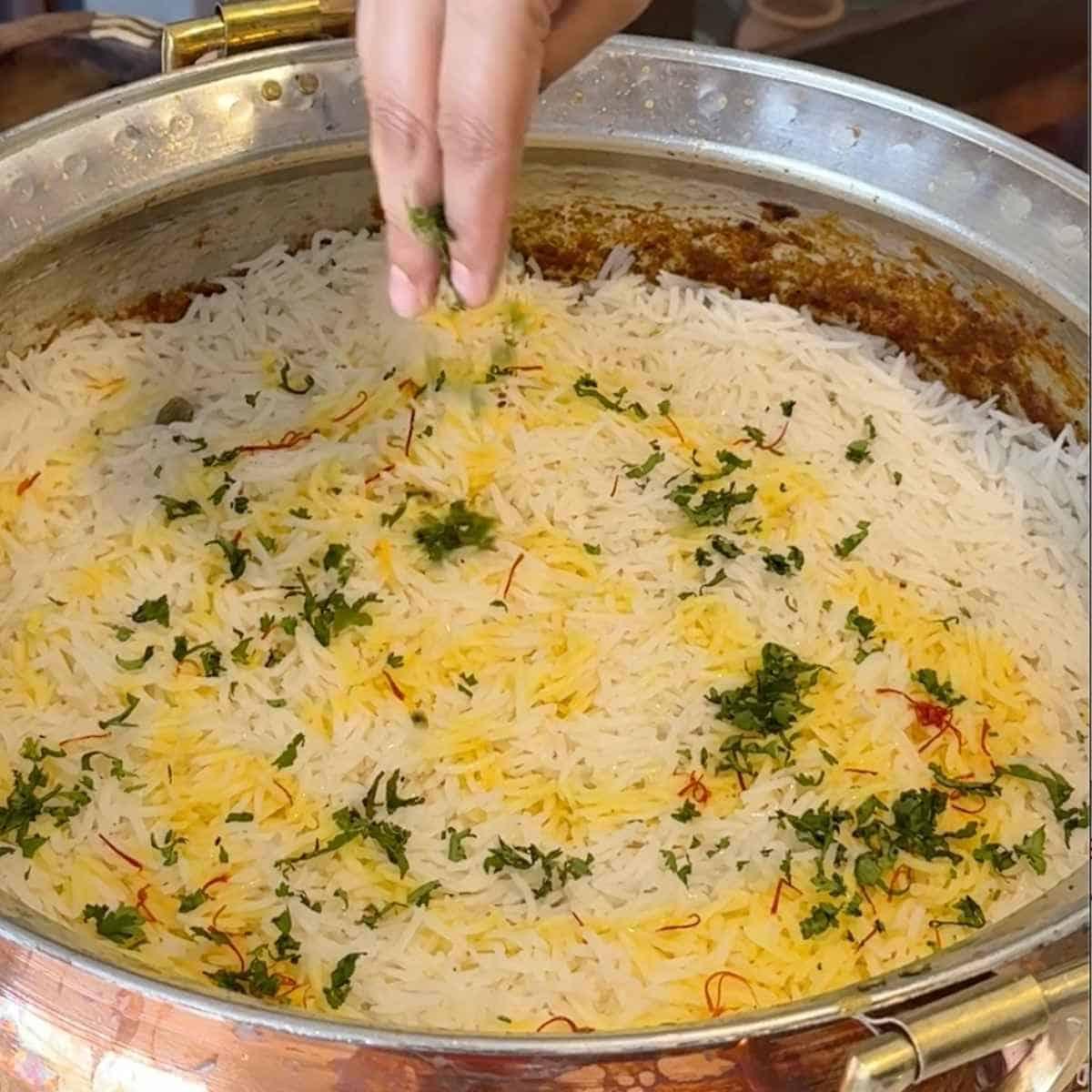 mushroom biryani step 3 - layering biryani
