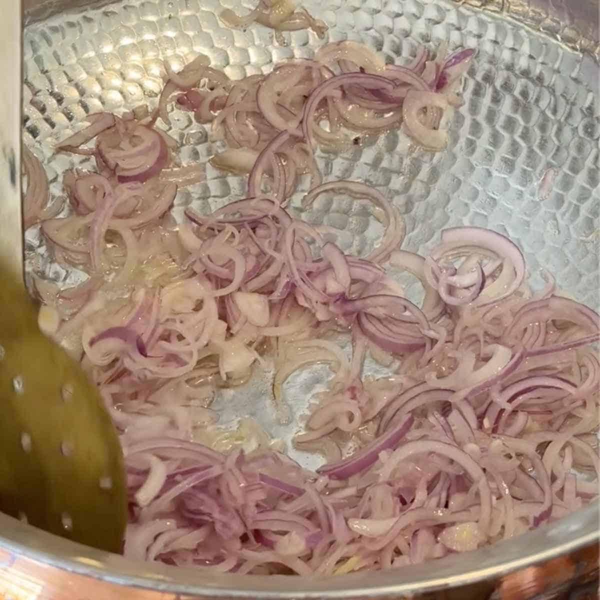 mushroom biryani step 3 - frying onions