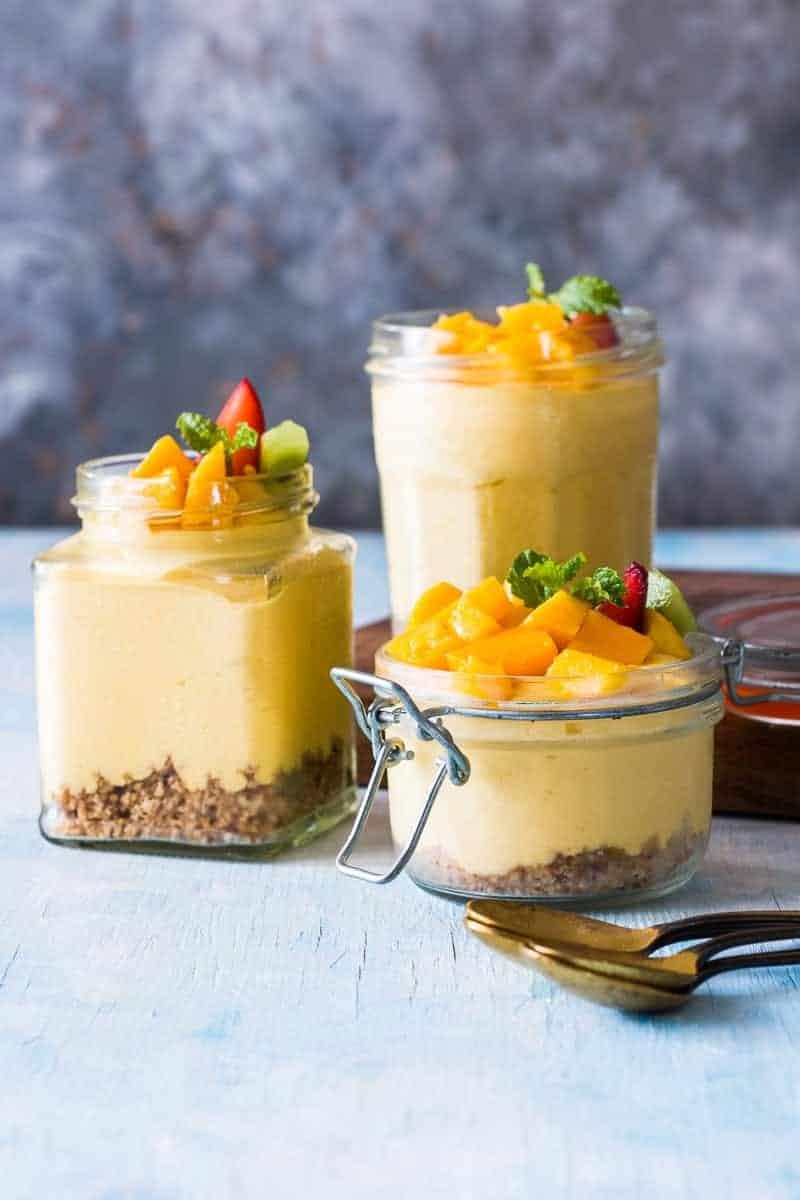 Easy 8 ingredient and no bake mango cheesecake mousse jars are insanely delicious, creamy dessert jars! Perfect weekend treat!