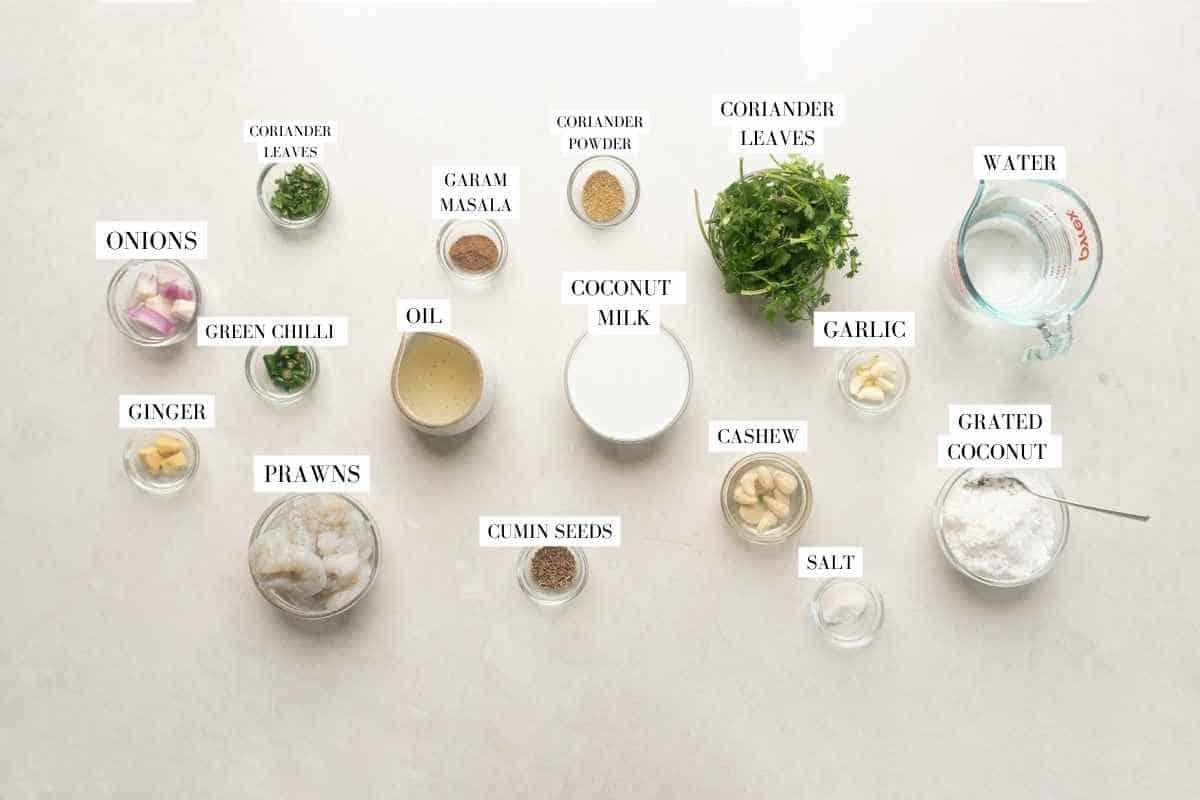 Picture of all the ingredients for Prawn green curry with text to identify them