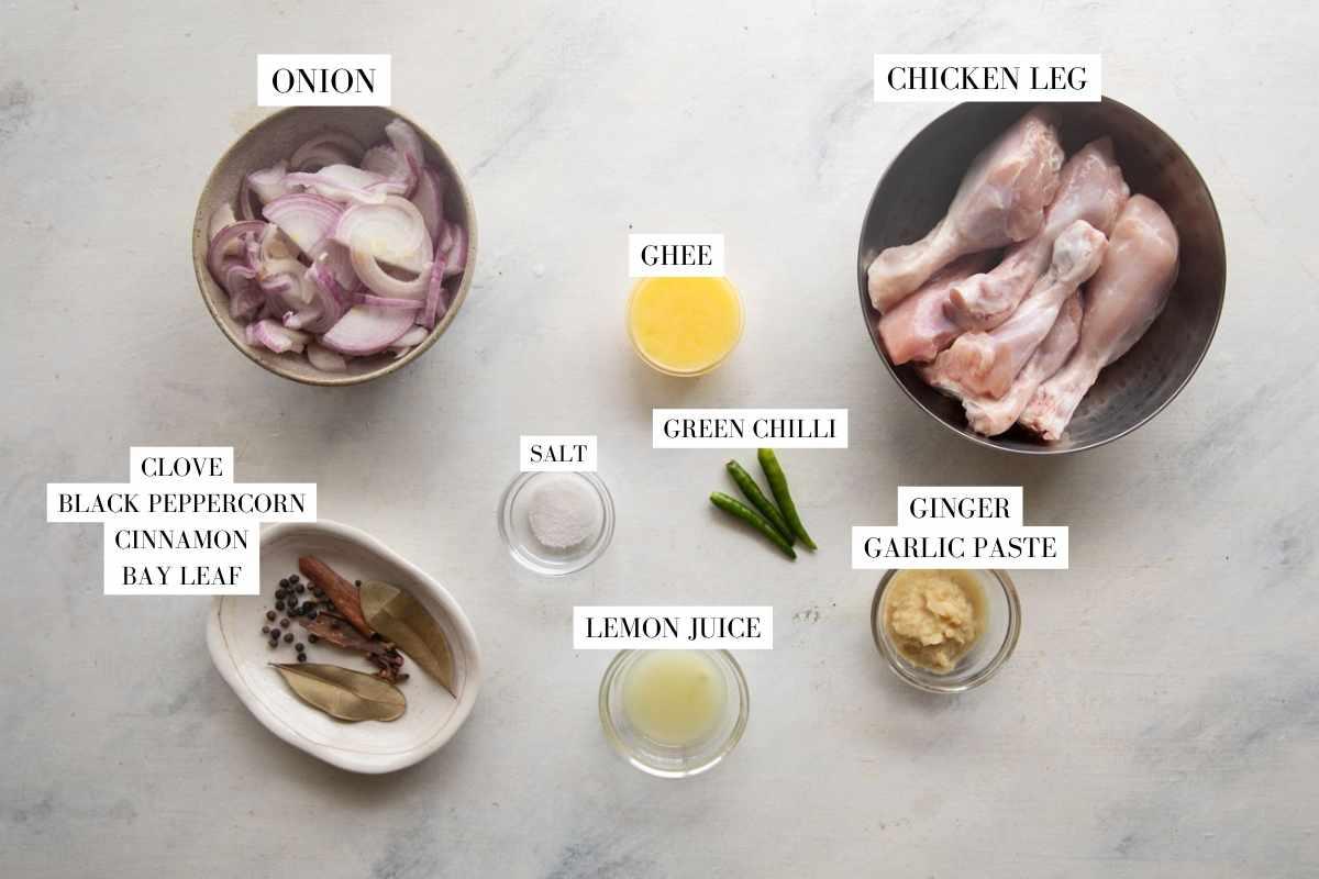 Picture of all the ingredients for Quick Onion Chicken with text to identify them