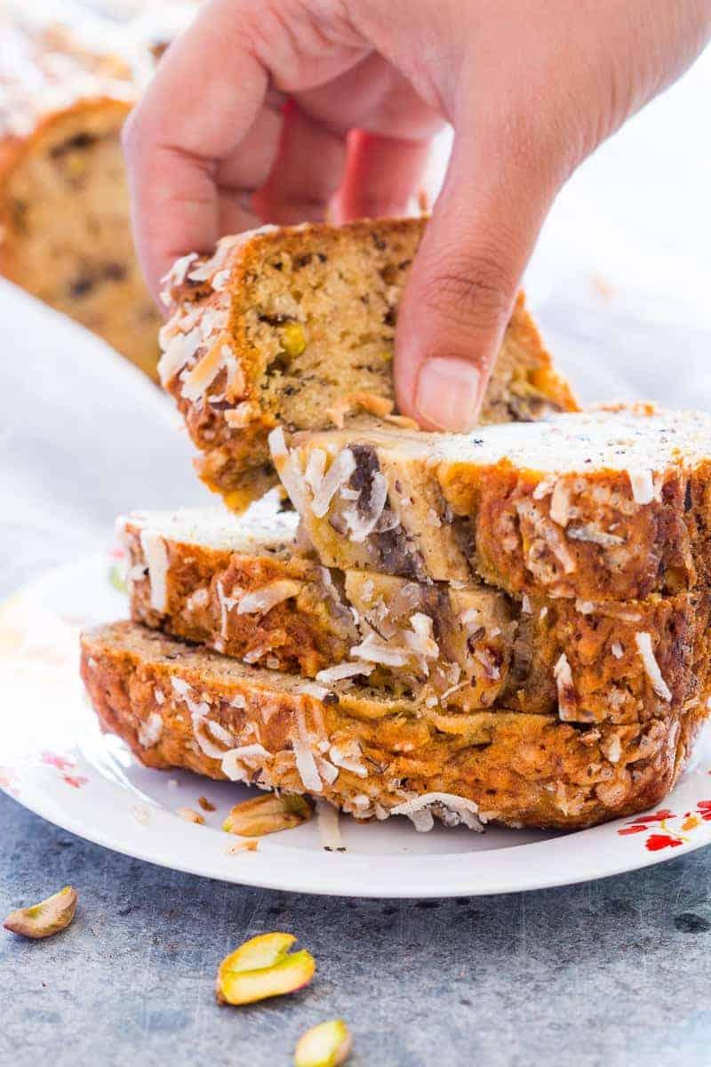 you only need a few simple ingredients to make this healthy and super quick coconut pistachio banana bread. Moist, nutty and the perfect holiday snack.