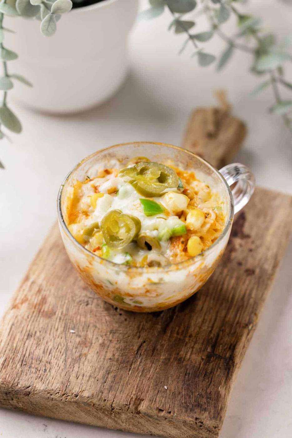 shot of microwave mexican cheesy rice in a mug