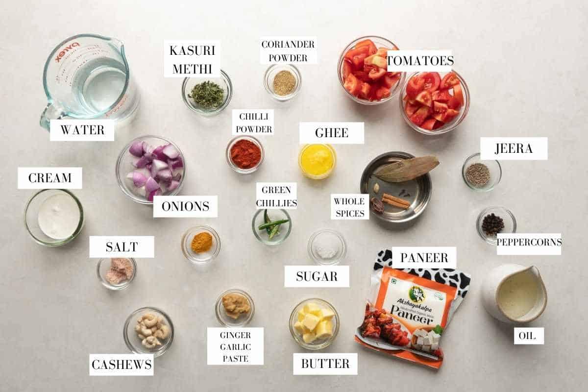 Picture of all the ingredients for shahi paneer with text to identify them