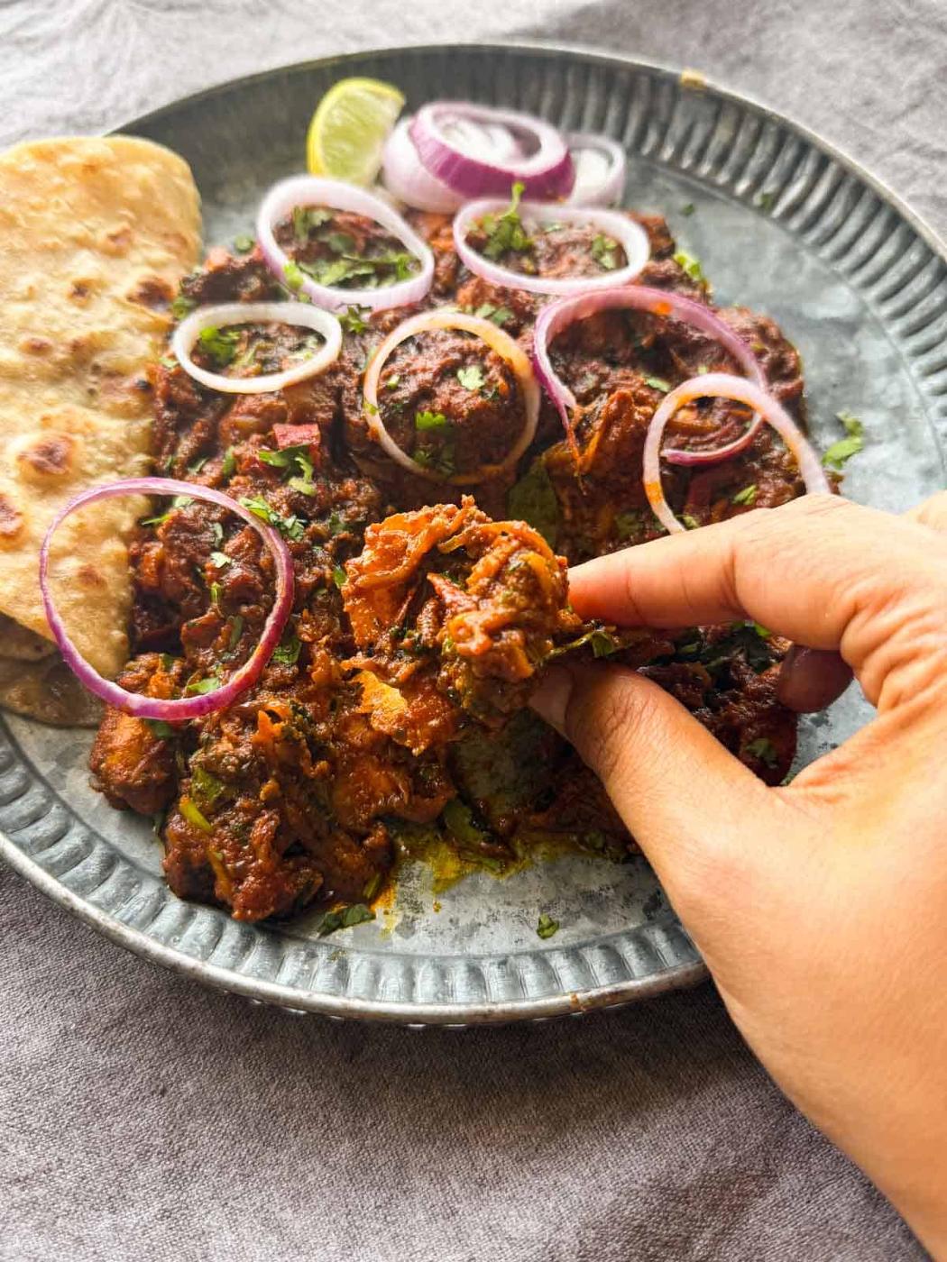 Indian chicken roast served with accompaniments