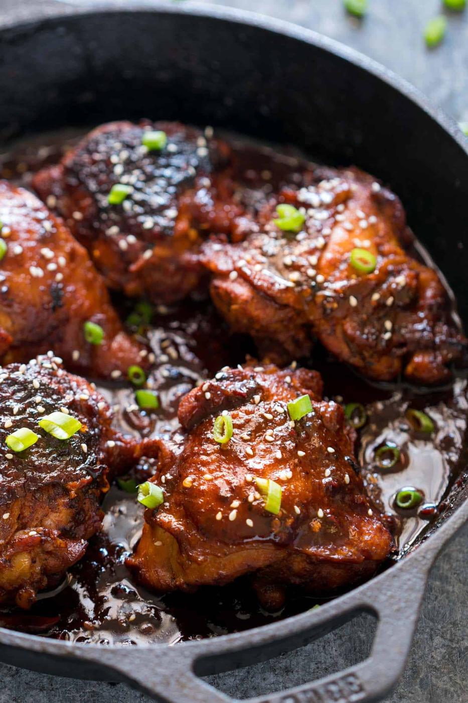 Spicy Korean Chicken Thighs in Gochujang Sauce - an intensely flavoured chicken recipe made in a cast iron pan for extra crispy, juicy thighs and a finger licking marinade!