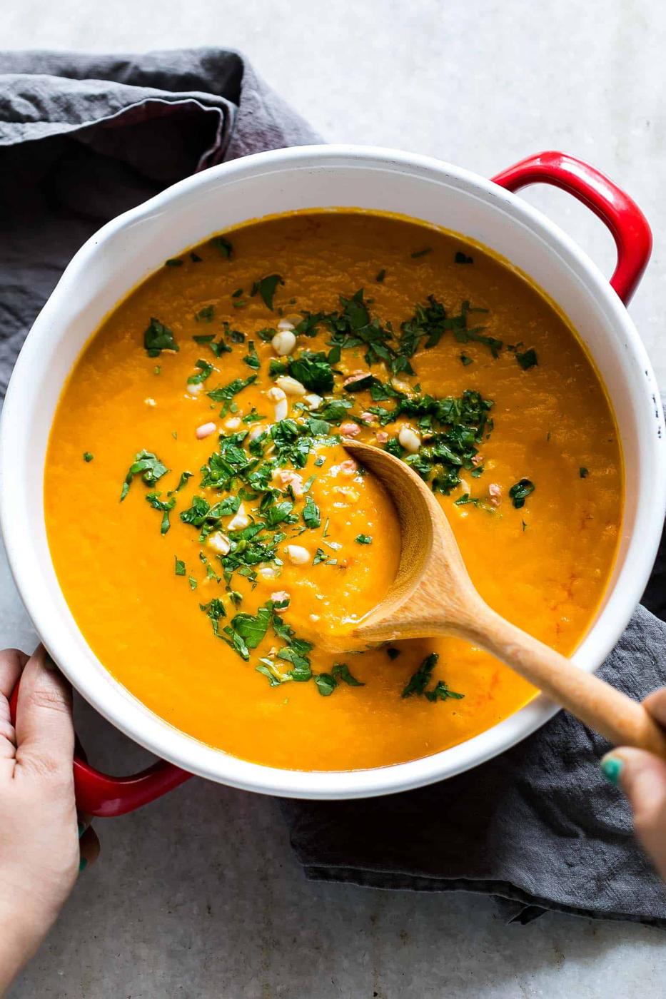 Thai Ginger Carrot Soup garnished with cilantro.