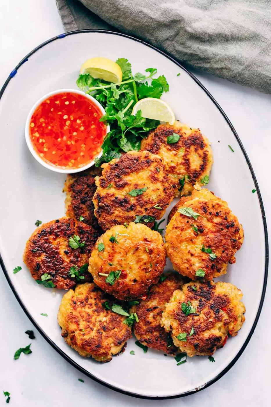 Easy Thai Shrimp Cakes served on a platter with thai sweet chilli sauce