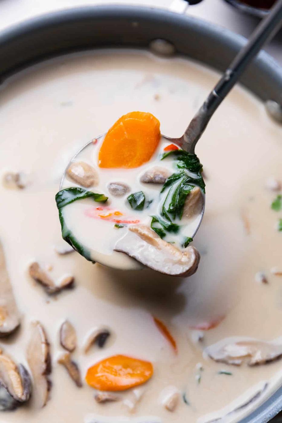 close up image of vegetarian tom kha soup to show the texture