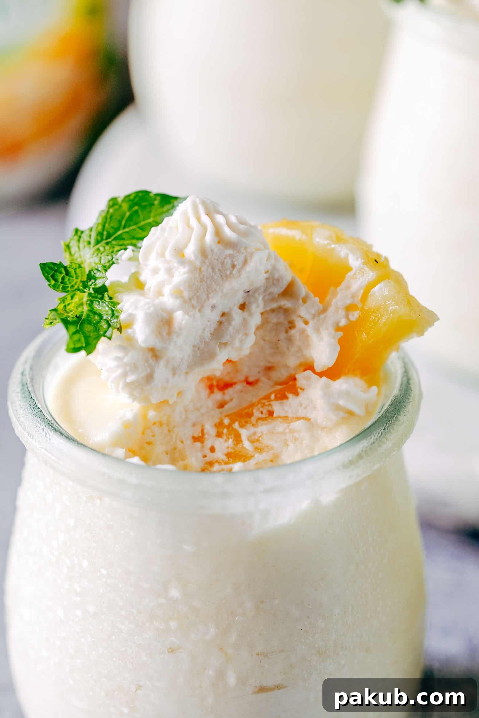 Tropical Escape: Eggless Pineapple Mousse 4 Ingredients for Easy Eggless Pineapple Mousse laid out, highlighting canned pineapple, heavy cream, and white chocolate.