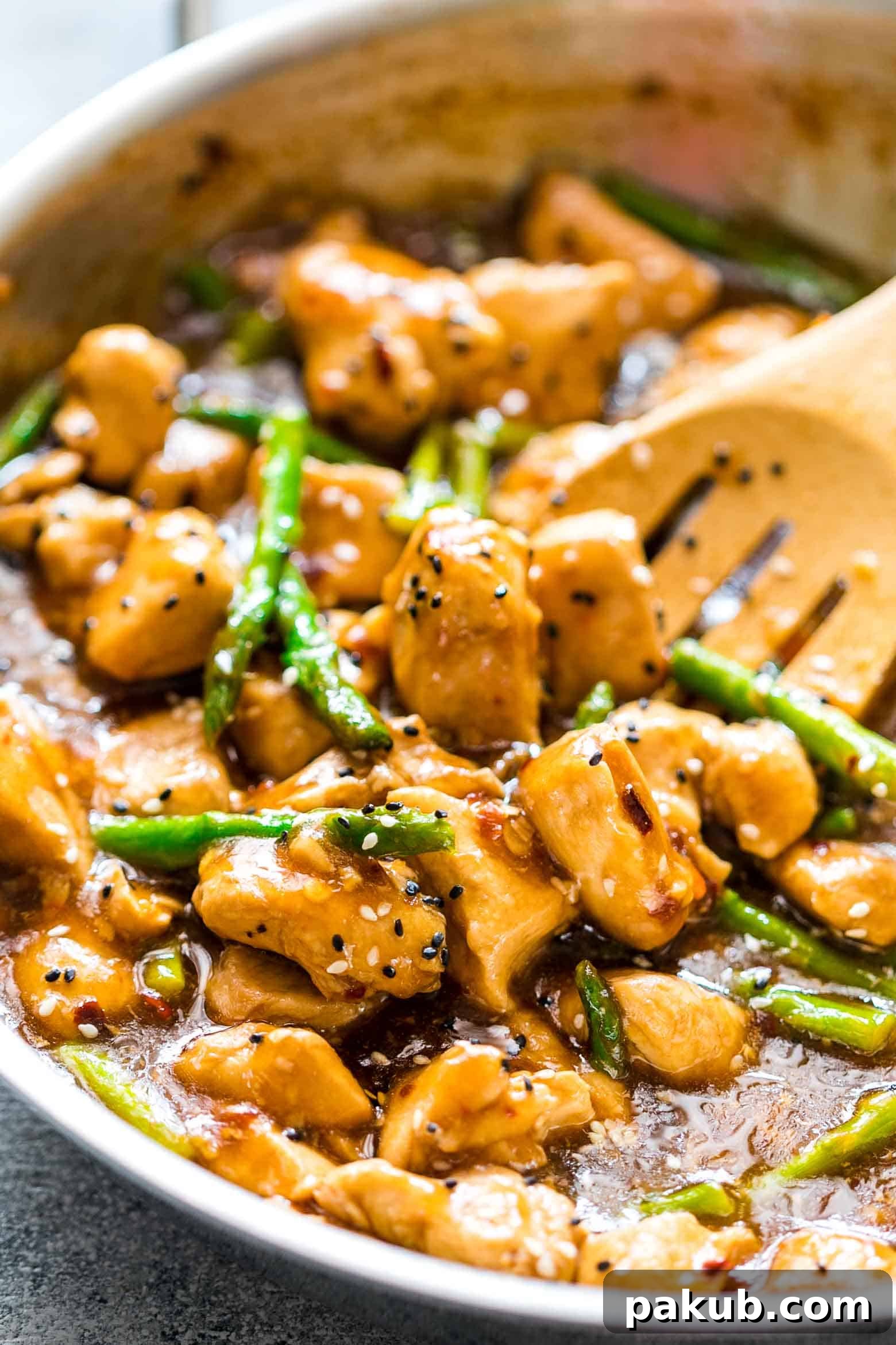 Zesty Lemon Ginger Chicken Asparagus Stir Fry 3 Close-up shot of Lemon Ginger Chicken Asparagus Stir Fry with vibrant green asparagus and tender chicken pieces.