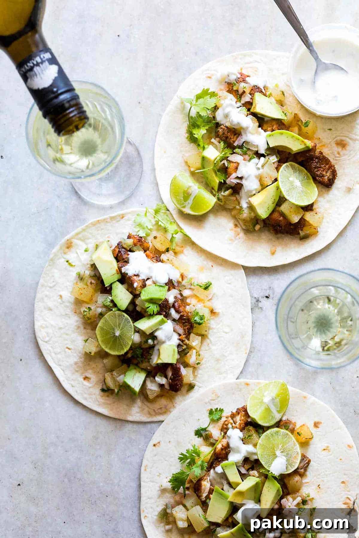 Sunshine Tilapia Tacos with Pineapple Salsa Burst 2 Tilapia Fish Tacos with Pineapple Salsa served with a side of Big Banyan's sauvignon blanc.