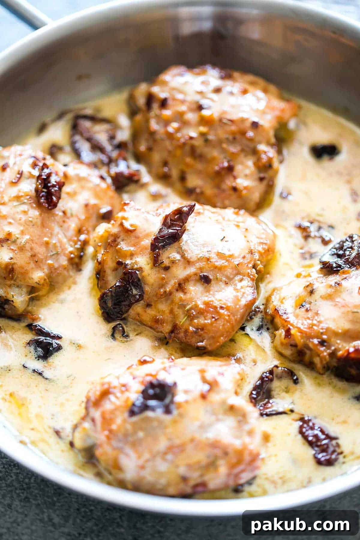 Creamy Tuscan Chicken and Sun-dried Tomato Pasta 2 Creamy Sun-dried Tomato Chicken simmering in a pan, ready to be served.
