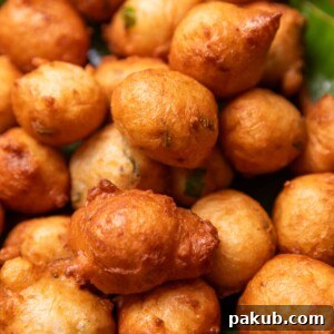 A close up image of Goli Bajji to show its crunchy exterior and soft interior