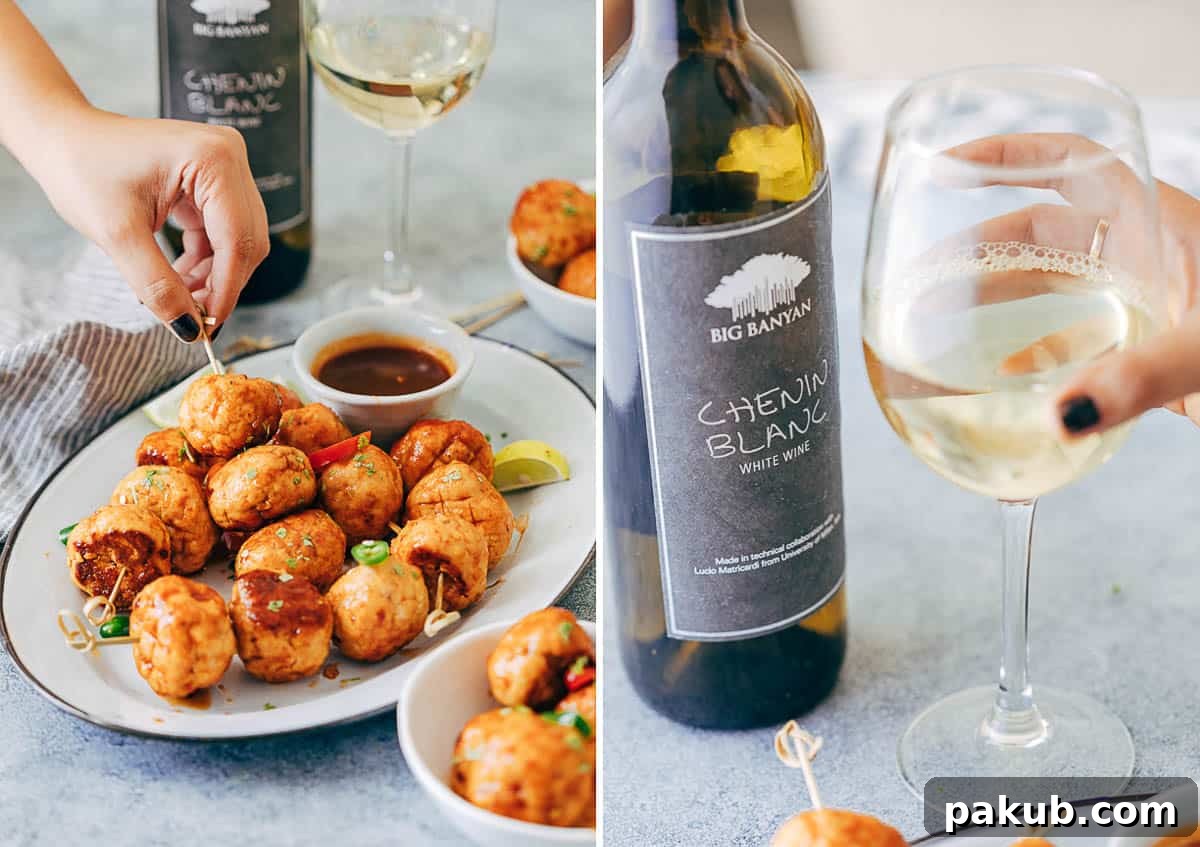 Dynamite Glazed Chicken Meatballs 5 Baked Firecracker Chicken Meatballs and a glass of refreshing Chenin Blanc wine, perfectly paired.