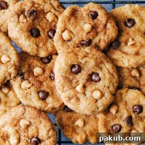Pumpkin Snickerdoodle Cookies baked and ready to eat, served on a rustic plate.
