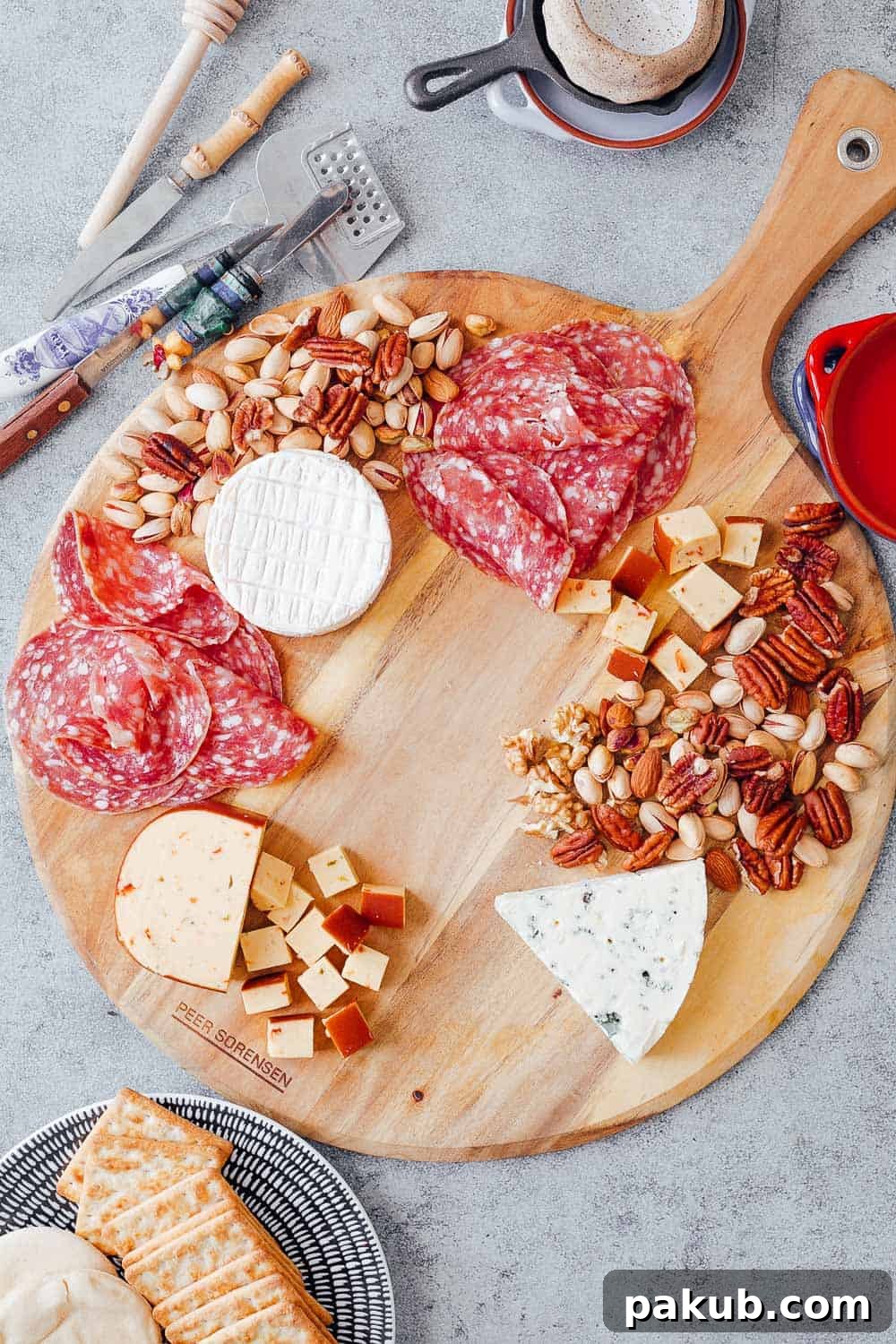 Building an Exquisite Wine and Cheese Board Without Overspending 5 Step #3 to create the ultimate wine and cheese board on a budget is to choose cheap charcuterie for the board along with any nuts that you already have in your pantry. Salami is usually cheaper than more expensive cuts like parma ham