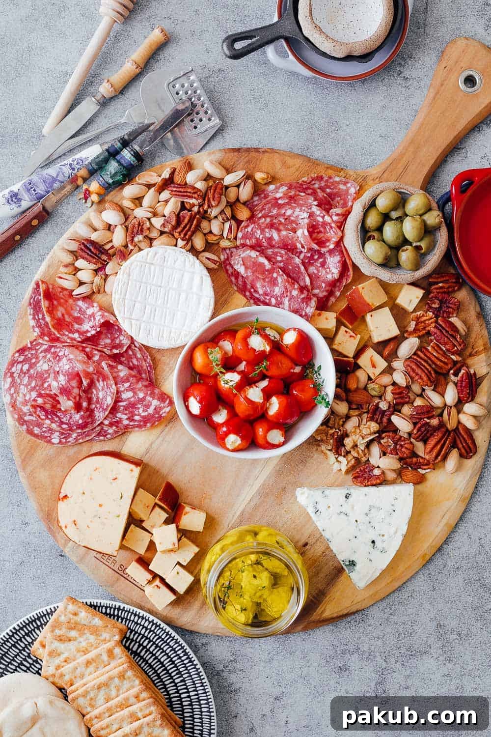 Building an Exquisite Wine and Cheese Board Without Overspending 6 Step #4 is to add salty nibbles such as olives, stuffed peppers, labneh etc to the ultimate wine and cheese board. Pick things that are already in your pantry so that you don't spend on anything additional