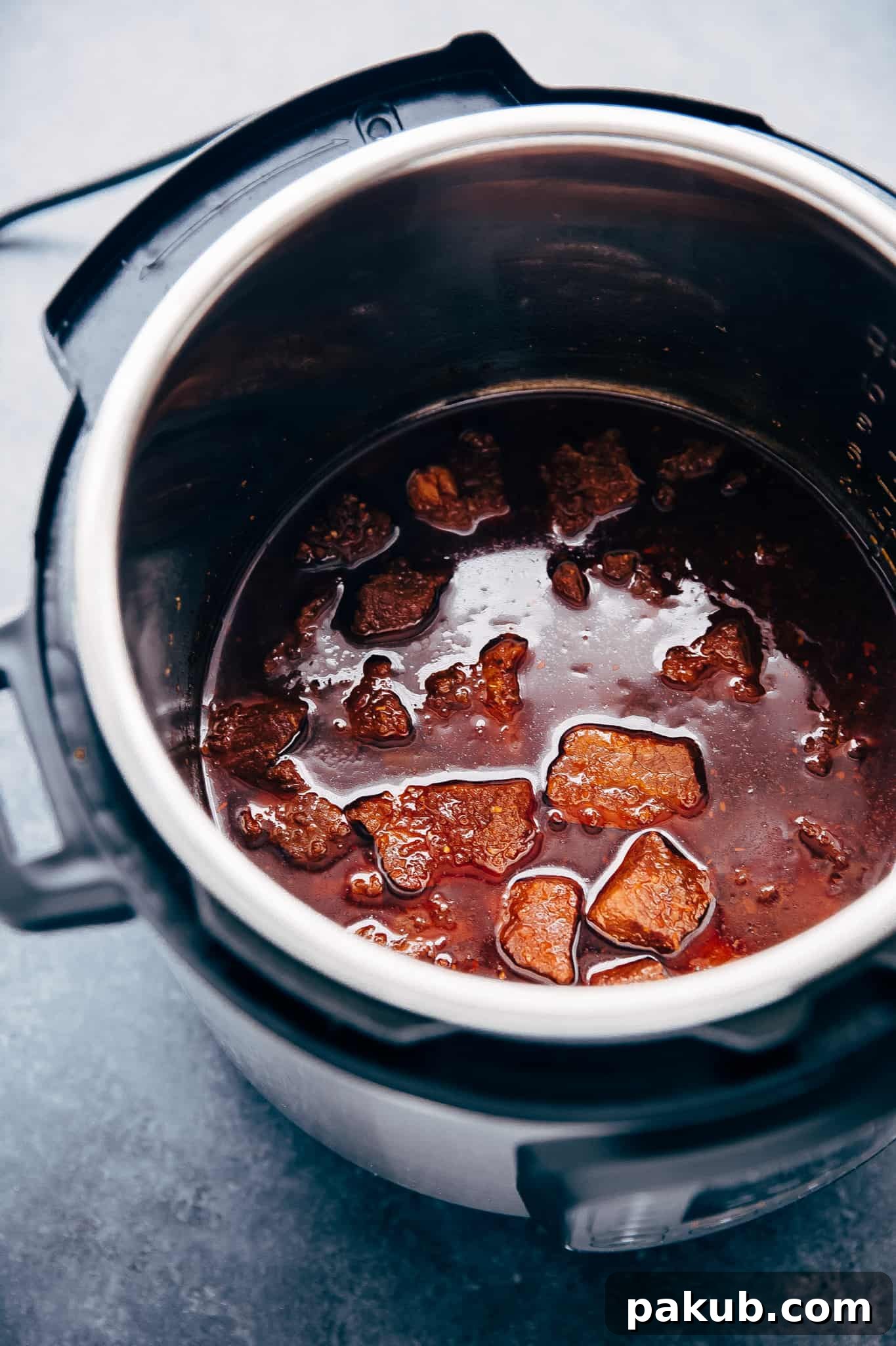 Master Your Instant Pot 21 Recipes for Every Meal 13 Delicious Instant Pot Korean Beef Bowls, featuring tender beef in a savory sauce.
