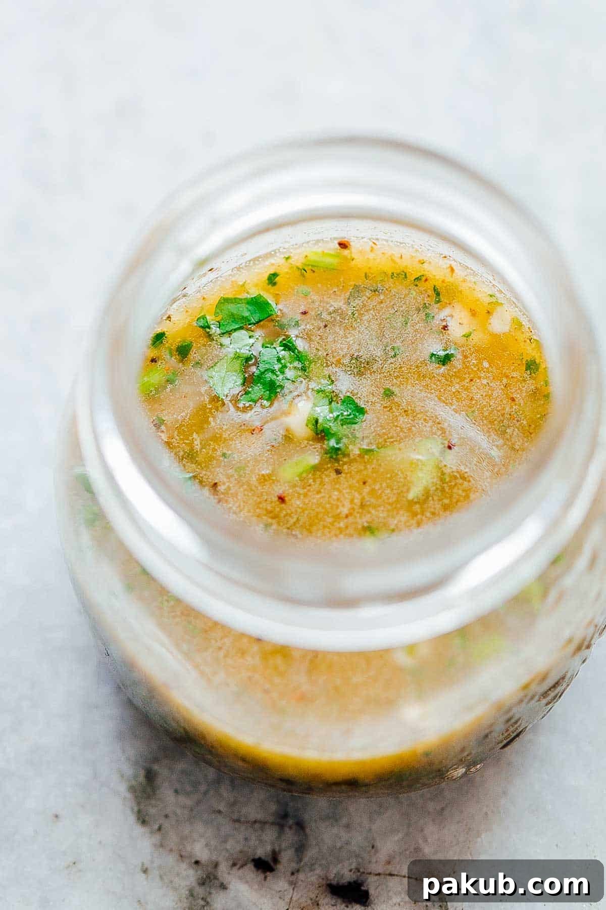 Zesty Cilantro Lime Salad Dressing in a glass jar, perfect for Southwest chicken salad.
