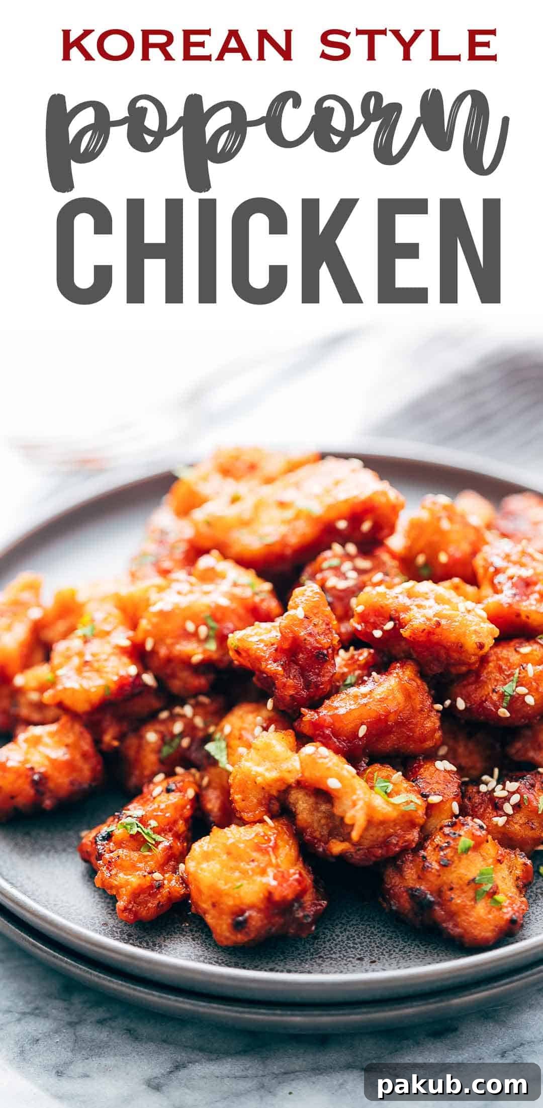 K-Style Crispy Chicken Poppers 3 KOREAN POPCORN CHICKEN is sticky, spicy, tangy and crunchy. Inspired by the hyper-famous Korean street snack, Dakgangjeong, boneless chicken is deep fried and tossed in a sweet, sour and spicy sauce that makes every bite super addictive. #chicken #appetizer #party #snack #recipe
